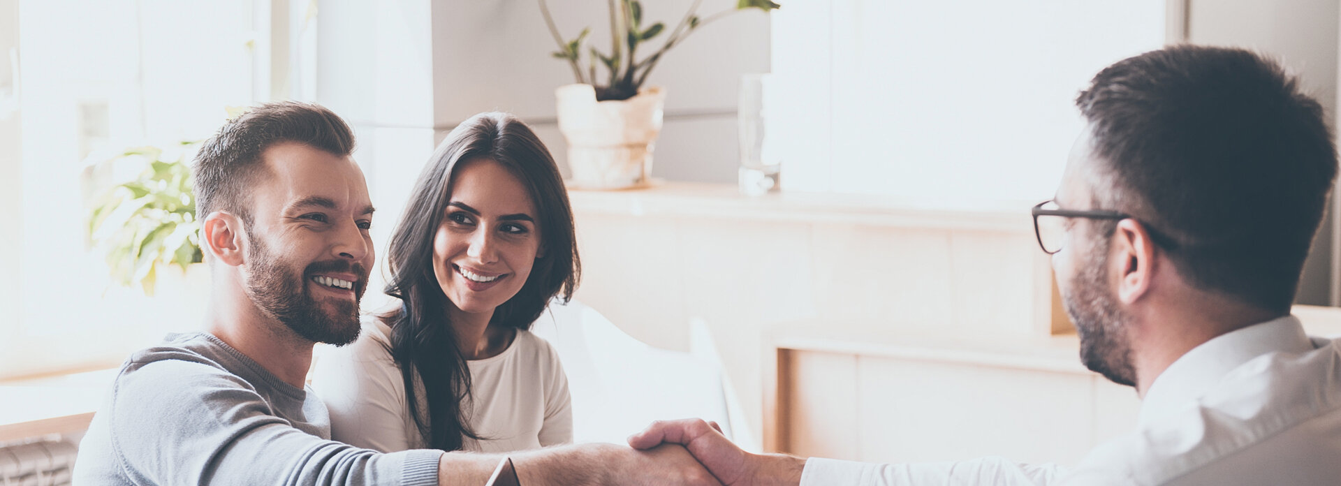 A couple in a meeting with a financial advisor