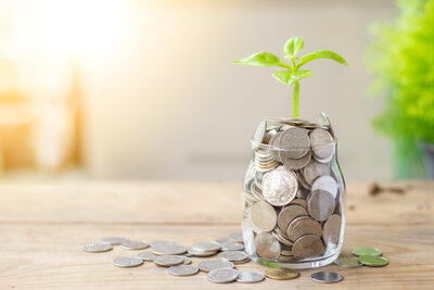 A savings jar full of coins